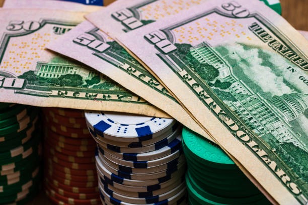 Live dealer rolling dice in Sic Bo